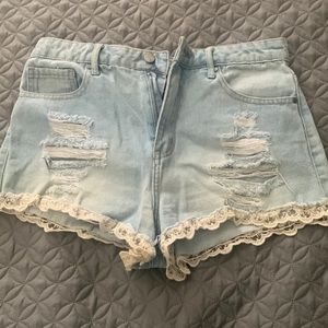 Ripped light wash shorts (: